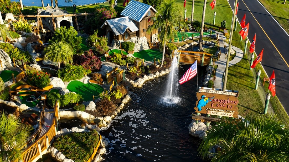 Smugglers Cove Adventure Golf, its landscaped course, waterfalls and fountain beside Gulf Blvd